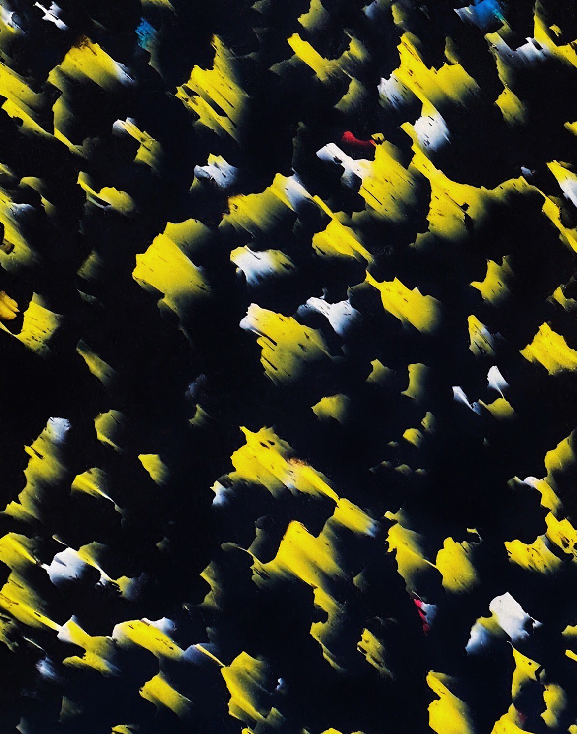 panneau noir avec parties jaunes, quelques endroits blancs, de petites taches rouges ou bleues
